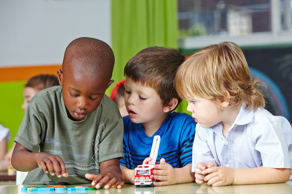 Children in Kindergarten Playing with Building Blocks